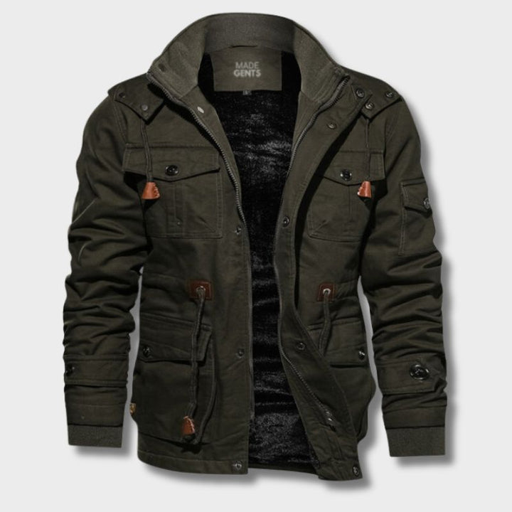 Olivgrüne Herrenjacke aus Baumwolle, Survival-Stil, mit Kapuze und Taschen.