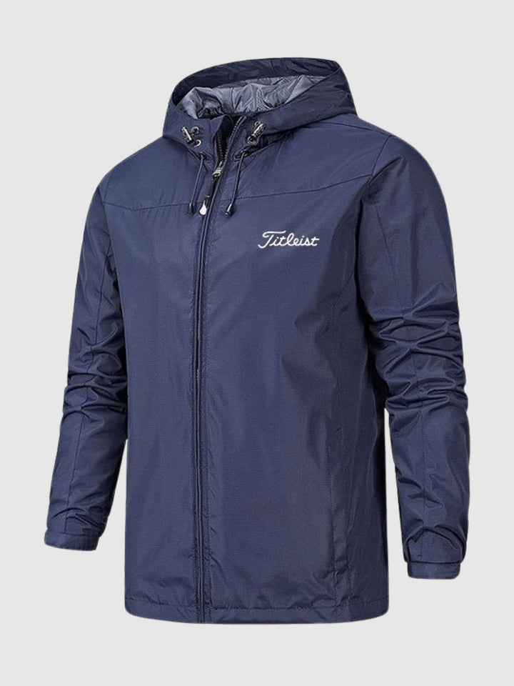 Dunkelblaue Titleist Herren-Regenjacke mit Kapuze, wasserabweisend, Outdoor-Bekleidung.