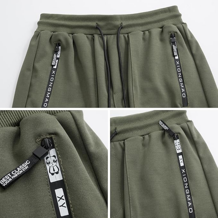 Grüne Jogginghose mit Reißverschlusstaschen, XIONGMAO-Logo, Baumwolle, Herrenmode.