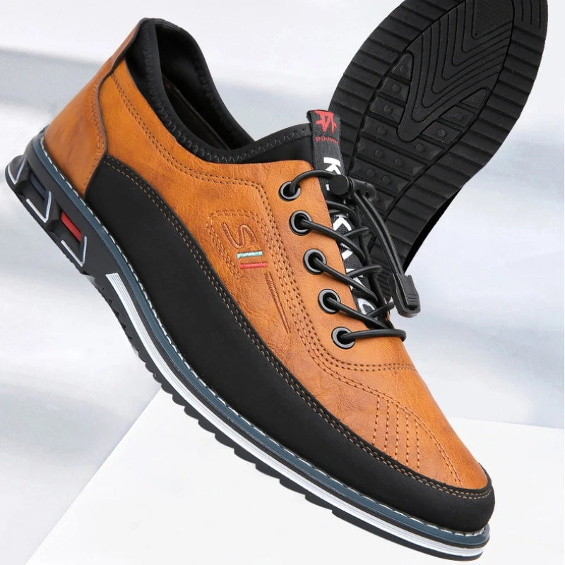 Brauner und schwarzer Herrenschuh aus Leder, sportlich-elegant, mit Schnürsenkeln.