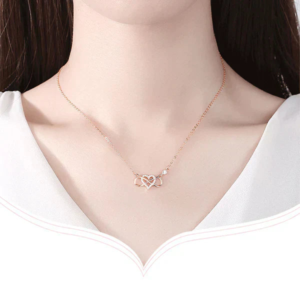 Damen Halskette, roségold, Herzanhänger, elegantes Design, Schmuck für Frauen.