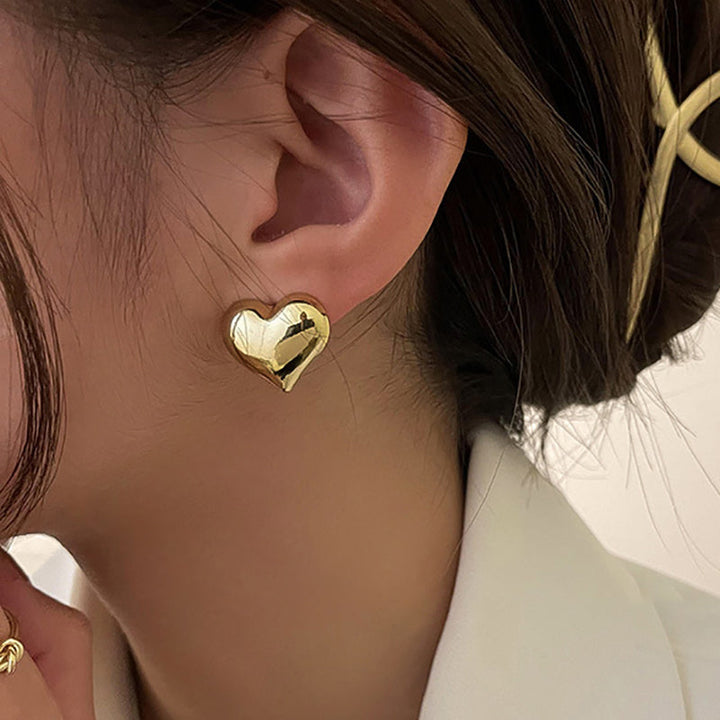 Goldene Herz-Ohrringe, minimalistisch, elegant, Damen-Schmuck, modisch, Geschenkidee.