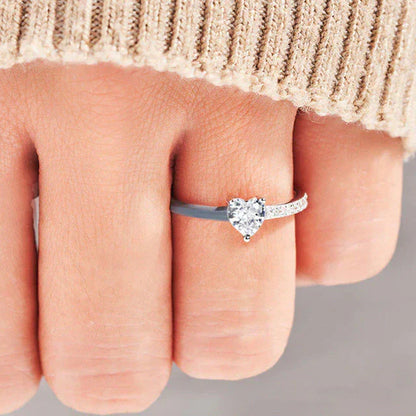 Herzförmiger Diamantring, Silber, Damen, Verlobung, elegantes Design, funkelnd, Schmuck.