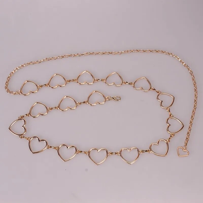 Goldene Herz-Halskette, filigranes Design, modisches Schmuckstück, elegantes Accessoire.