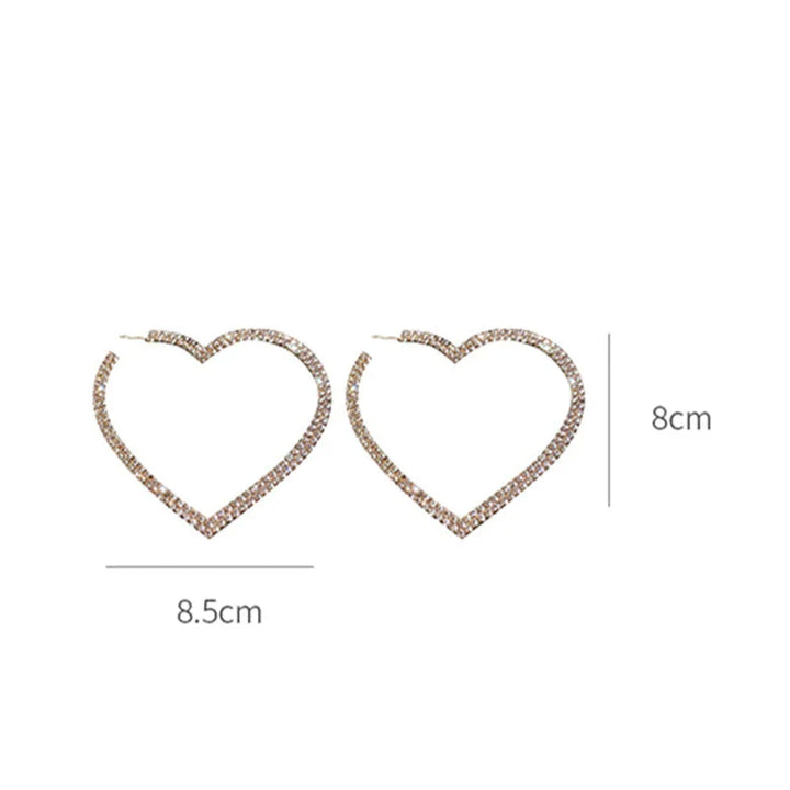 Herzförmige Ohrringe, goldfarben, 8,5 cm, Strasssteine, Modeschmuck, Damenaccessoire.