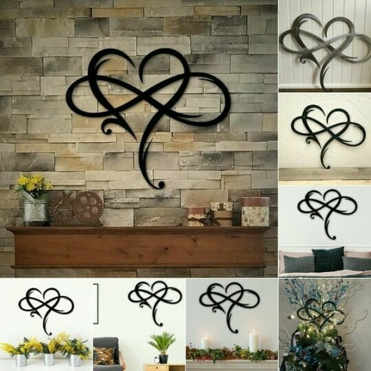 Schwarze Metall-Wanddekoration in Herzform auf Steinwand, modernes Design, Wohnzimmer-Dekor.
