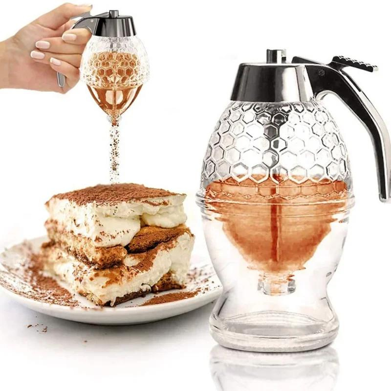 Honigspender aus Glas mit Wabenmuster, ideal für Desserts, ergonomischer Griff.