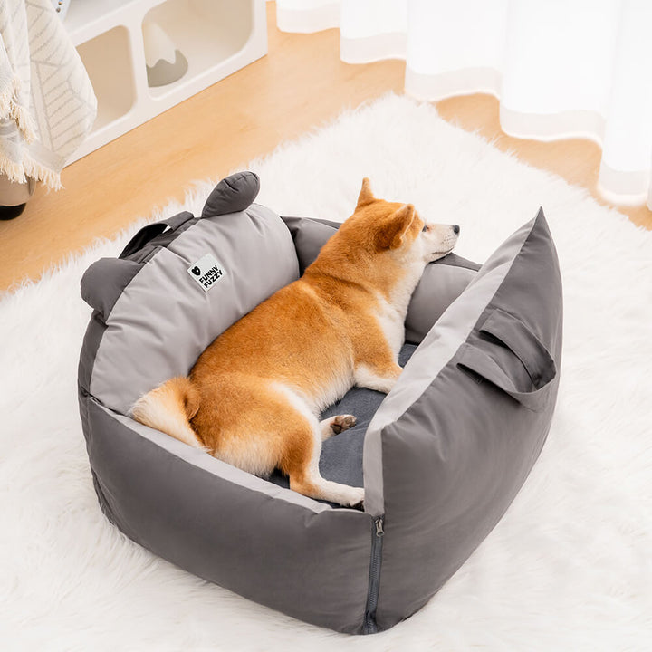 Hundebett Auto grau mit Bärenohren, Sicherheitsbett für Haustiere, gemütlich und stilvoll.