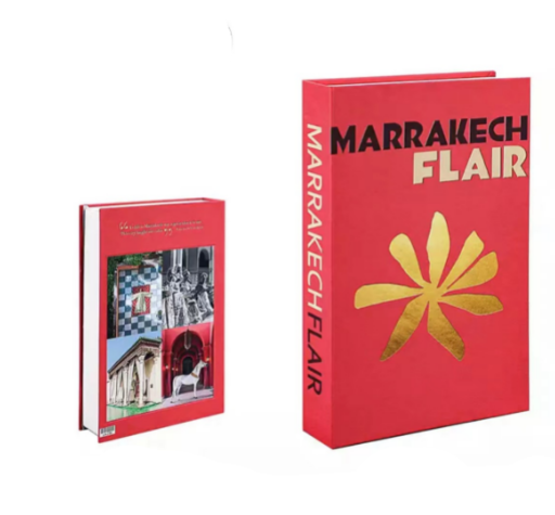Rotes Buch "Marrakech Flair" mit goldener Blume, Hardcover, Reise- und Kulturführer.