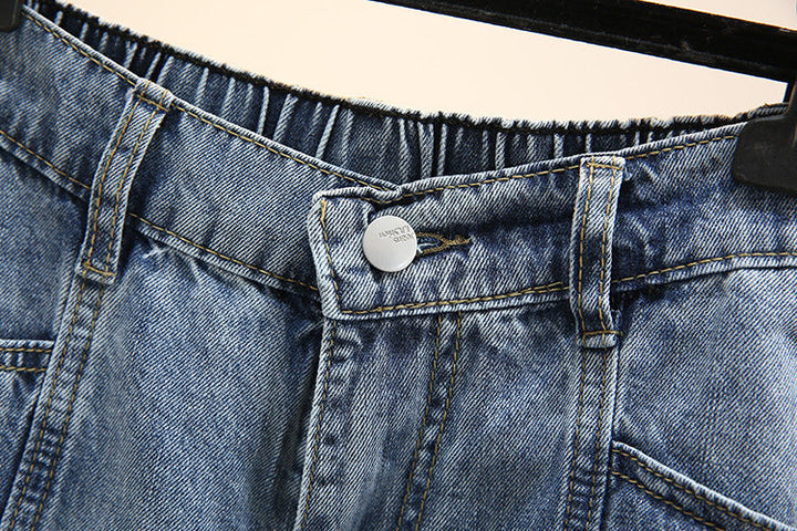 Jeansrock aus blauem Denim mit elastischem Bund und Knopfverschluss, Damenmode.
