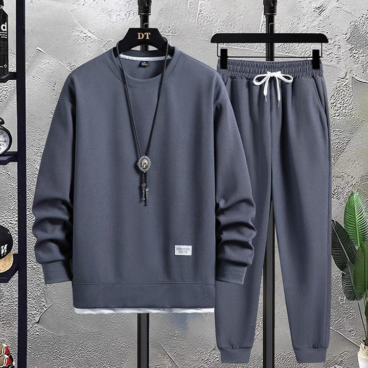 Graues Herren-Jogginganzug-Set, Sweatshirt und Jogginghose, bequem, sportlich.