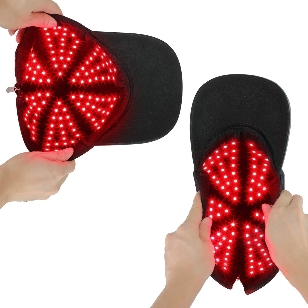 Schwarze LED-Lichttherapie-Kappe, rot leuchtend, für Haarwachstum und Kopfhautpflege.