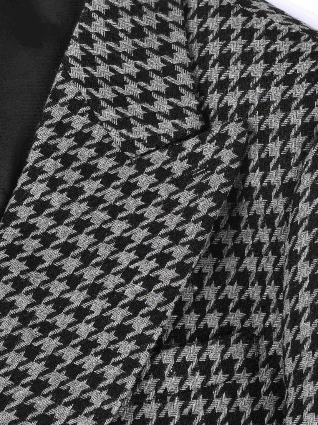 Schwarz-weißes Hahnentritt-Muster Sakko aus Wolle, elegantes Herrenmode-Design.