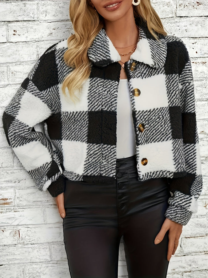 Damen Karo-Jacke, schwarz-weiß, Knöpfe, Herbstmode, warm, stylisch, Freizeitkleidung.