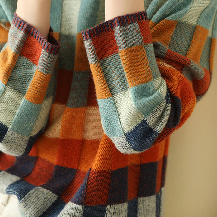 Bunte karierte Strickpullover-Ärmel, Herbstmode, Damenbekleidung, weiches Material.