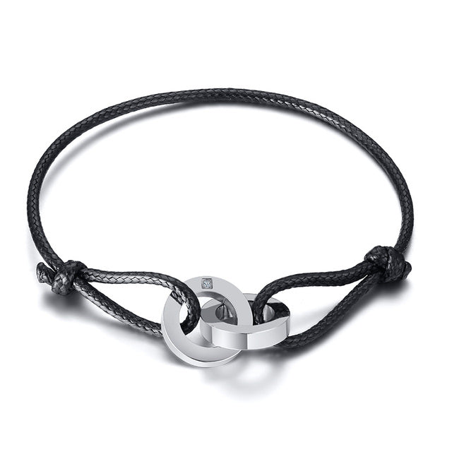 Schwarzes verstellbares Karma-Armband mit silbernem Kreisanhänger, spiritueller Yoga-Schmuck.