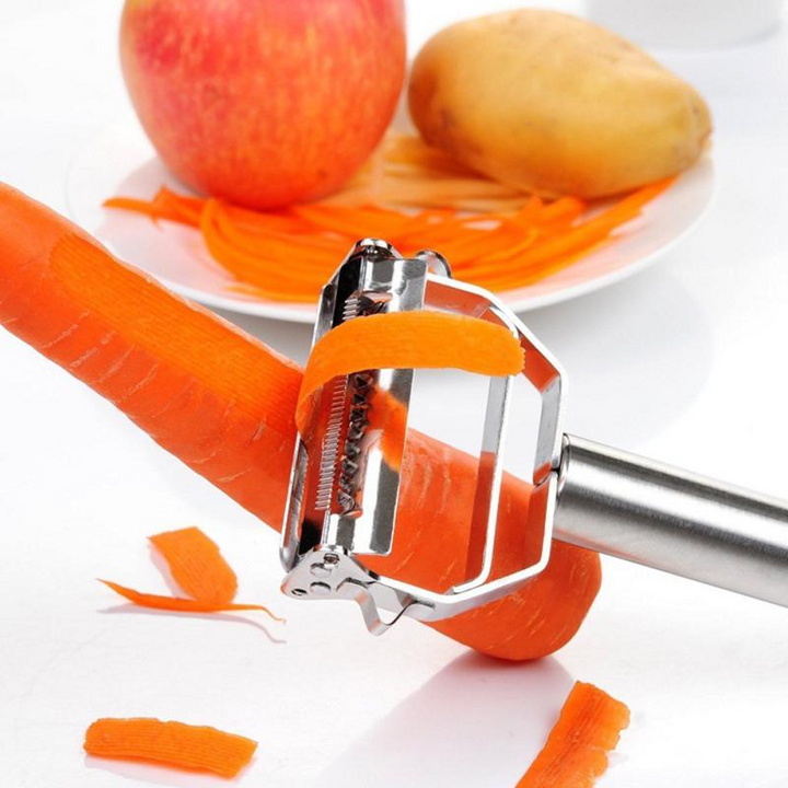 Edelstahl-Gemüseschäler schält Karotte, Apfel und Kartoffel, Küchenwerkzeug.