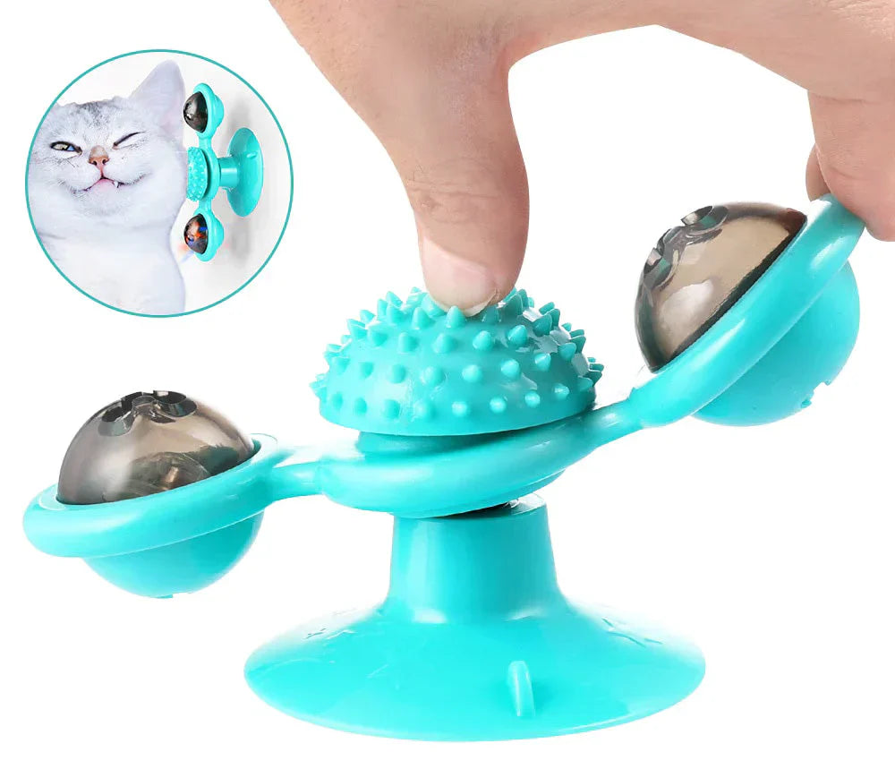 Katzenspielzeug mit Saugnapf, türkis, rotierend, interaktiv, mit Spikes und Glöckchen.