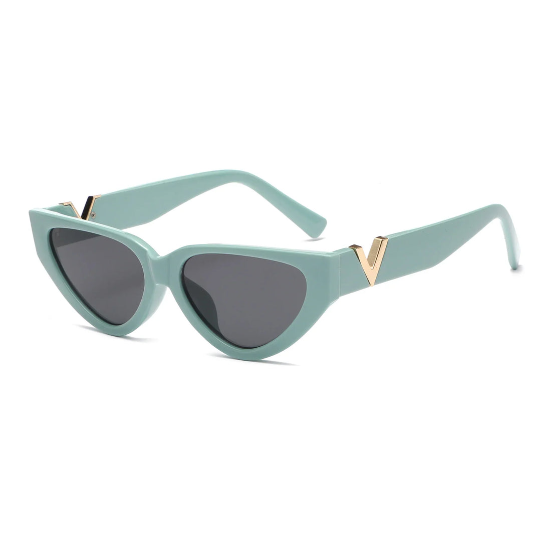 Mintgrüne Cat-Eye-Sonnenbrille mit goldenen Details, UV-Schutz, modisches Accessoire.