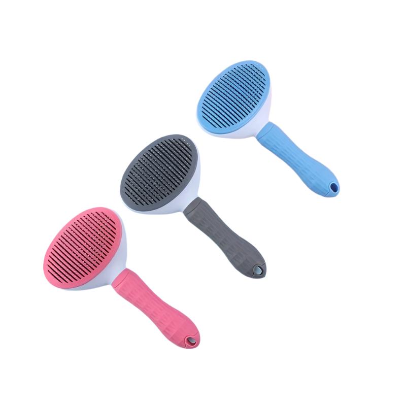 Drei bunte Katzenstreuschaufeln aus Kunststoff in Blau, Grau und Rosa mit ergonomischem Griff.