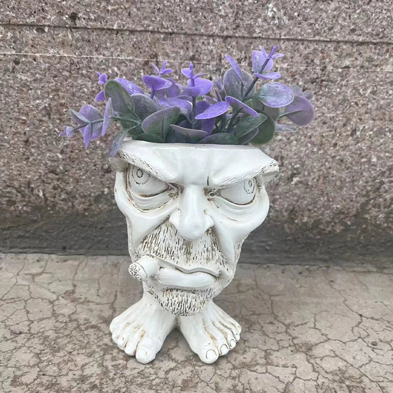 Keramik-Blumentopf in Form eines Gesichts mit lila Blumen, dekorativer Pflanzkübel, Gartenaccessoire.