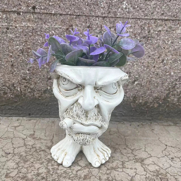 Keramik-Blumentopf in Form eines Gesichts mit lila Blumen, dekorativer Pflanzkübel, Gartenaccessoire.