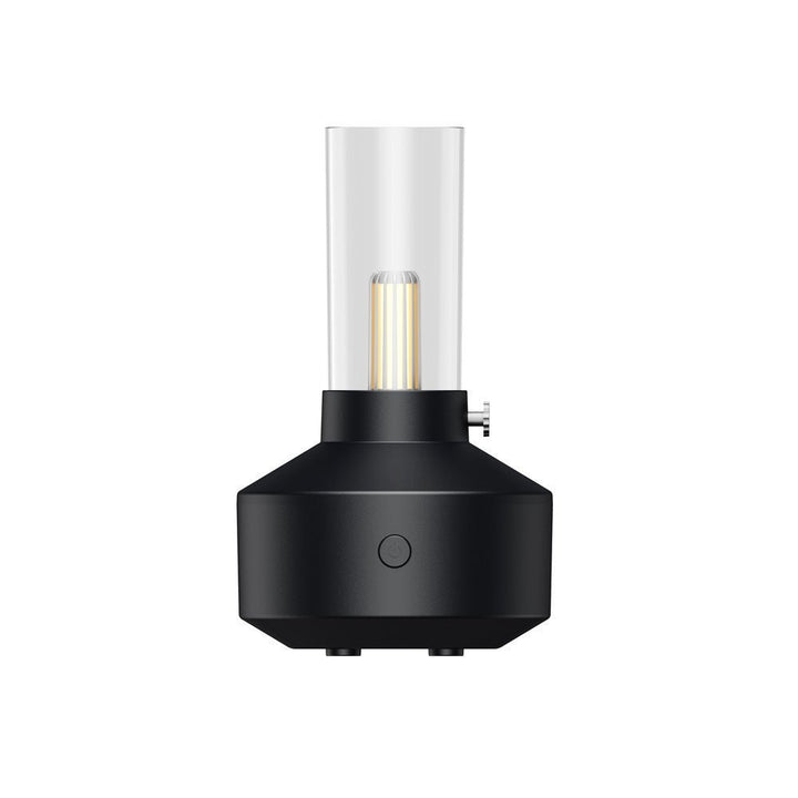 Schwarzer Aromatherapie-Diffuser mit Kerzenlicht-Design, Glaszylinder, LED-Licht.