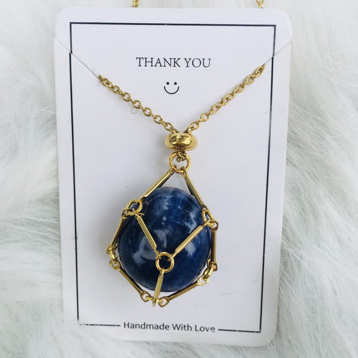 Blauer Edelstein-Anhänger mit goldener Kette, handgefertigter Schmuck, Geschenkidee.
