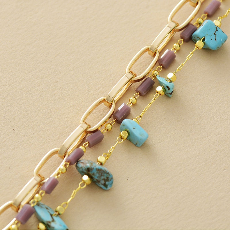 Goldene Gliederkette mit türkisfarbenen Steinen und Perlen, modisches Armband für Damen.