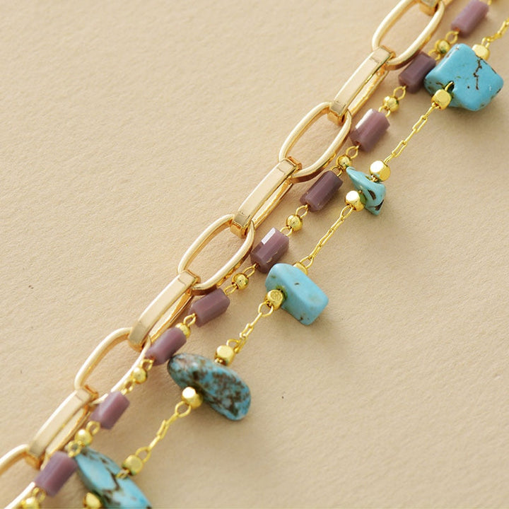 Goldene Gliederkette mit türkisfarbenen Steinen und Perlen, modisches Armband für Damen.