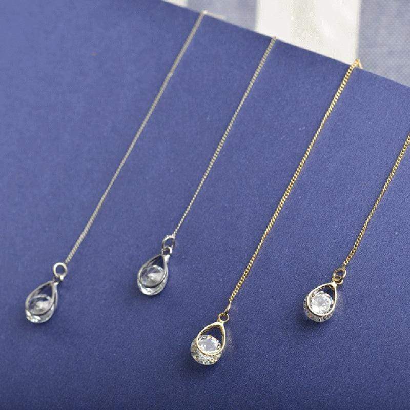 Lange Tropfen Strass Ohrringe, silber und gold, eleganter Schmuck, modisch, Damenaccessoire.