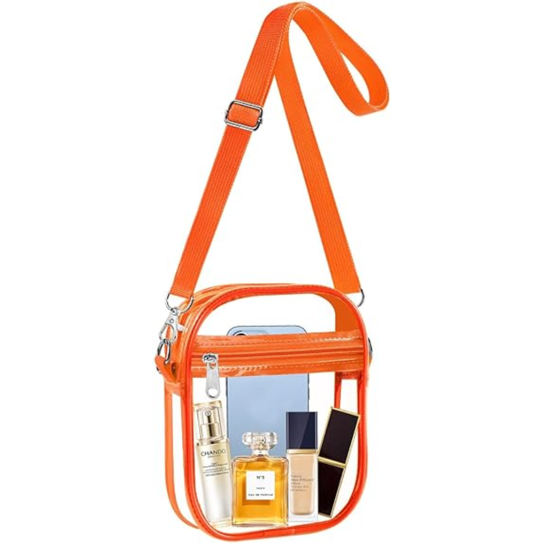 Orange transparente Umhängetasche, ideal für Reisen, mit Parfümflaschen und Smartphone.