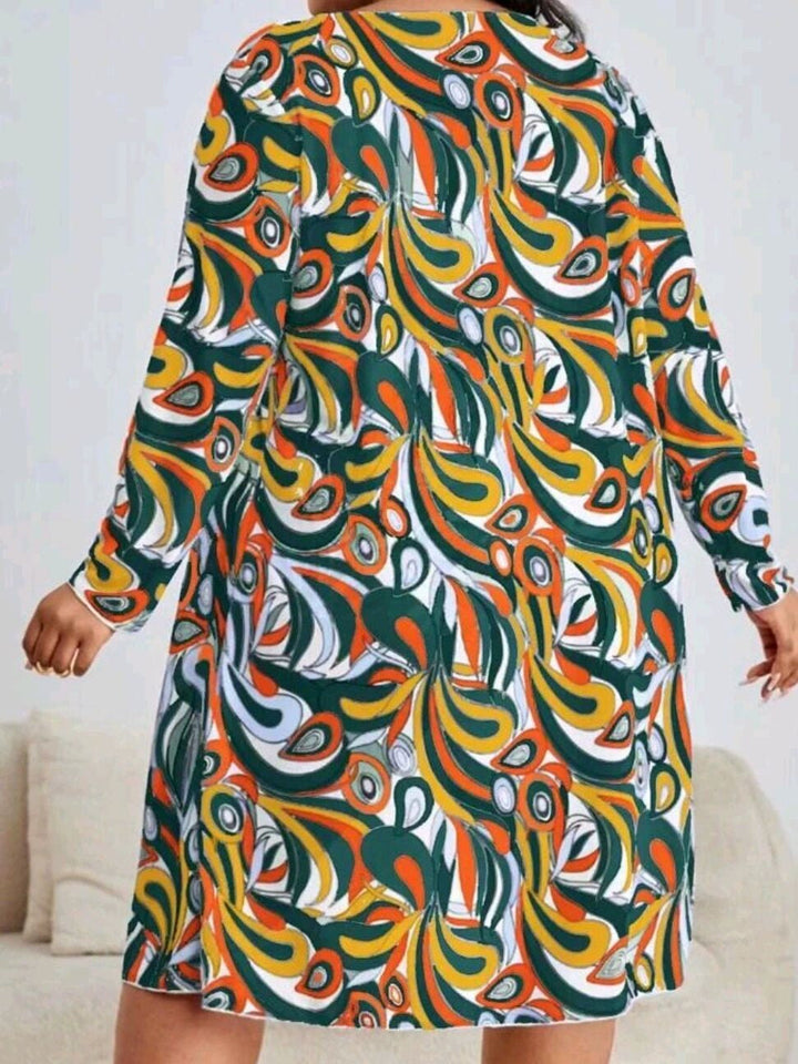Buntes Kleid mit abstraktem Muster, langärmelig, knielang, aus Baumwolle, Damenmode.