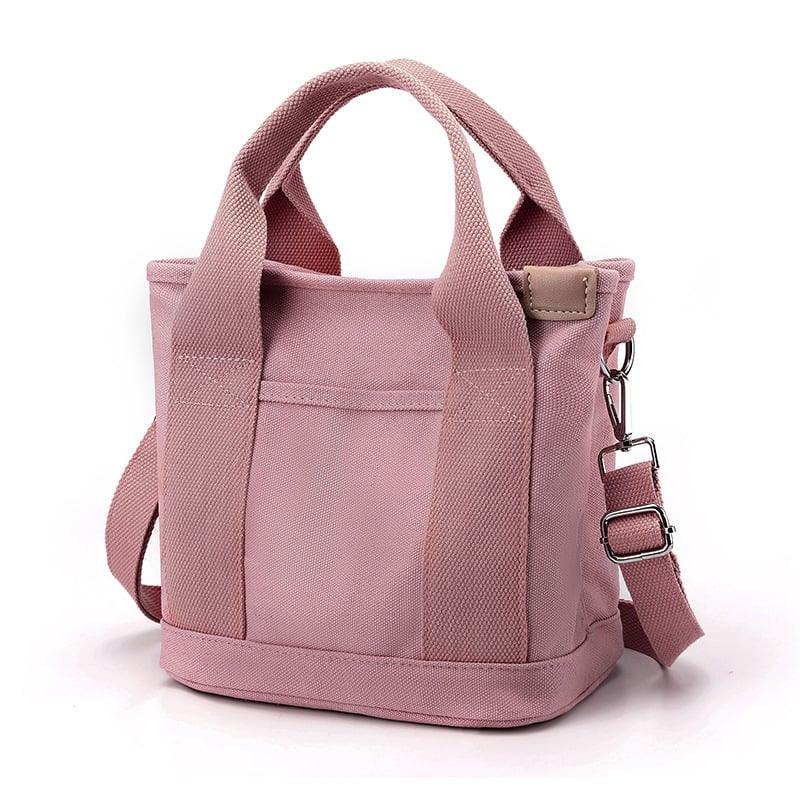 Rosa Canvas-Umhängetasche für Damen, klein, mit verstellbarem Riemen, modisch und praktisch.