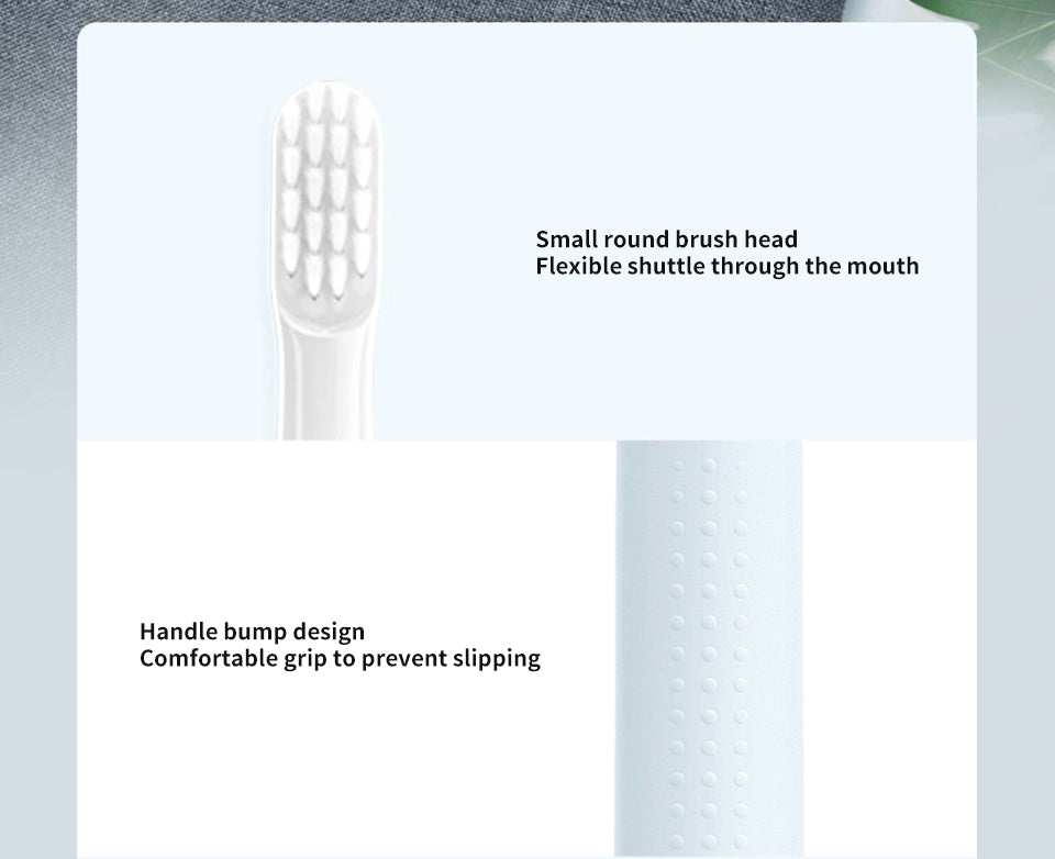 Zahnbürste mit kleinem, rundem Bürstenkopf und rutschfestem Griff, weiß, ergonomisches Design.