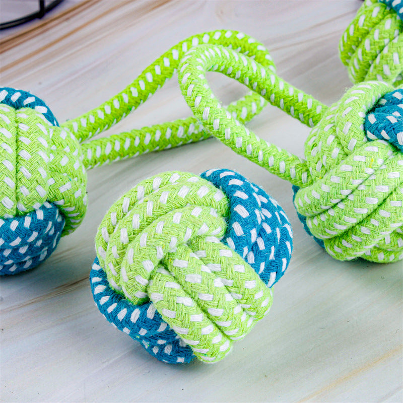 Grünes und blaues Kauspielzeug für Hunde, aus robustem Seil, ideal für Zahnpflege.