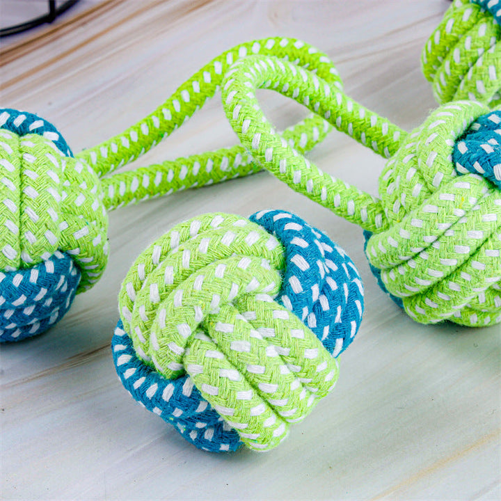 Grünes und blaues Kauspielzeug für Hunde, aus robustem Seil, ideal für Zahnpflege.