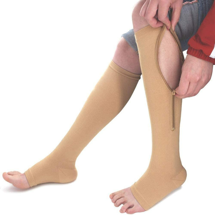 Beige Kompressionsstrümpfe mit Reißverschluss, Unisex, Knielang, für bessere Durchblutung.