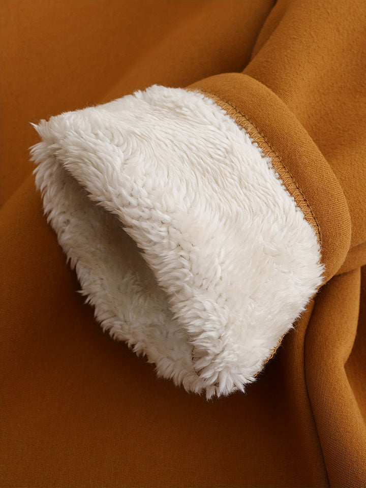 Brauner Fleece-Pullover mit weißem Plüschfutter, warmes Winterkleidungsstück für Damen.