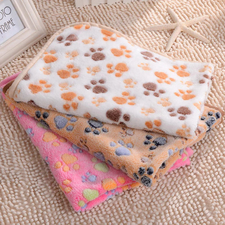 Weiche Fleece-Haustierdecke mit Pfotenmuster, mehrfarbig, für Katzen und Hunde.
