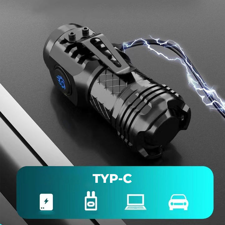 Schwarze, kompakte Typ-C-Taschenlampe mit USB-Anschluss, ideal für Outdoor und Notfälle.