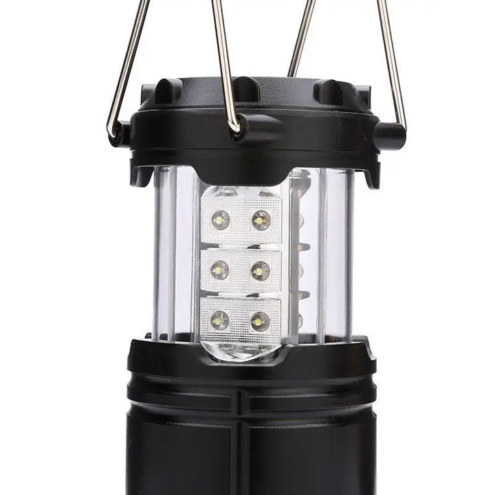 Schwarze LED-Campinglaterne, tragbar, batteriebetrieben, Outdoor-Beleuchtung.
