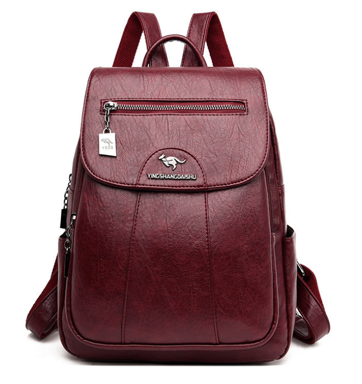Roter Damenrucksack aus Leder mit Reißverschluss, modisch und geräumig für Alltag und Reisen.