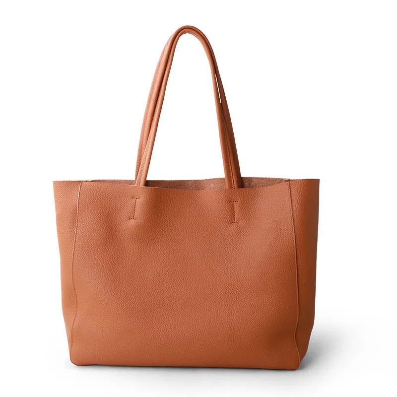 Braune Ledertasche, Shopper, Damen, elegant, geräumig, modisch, Accessoire, Alltagstasche.