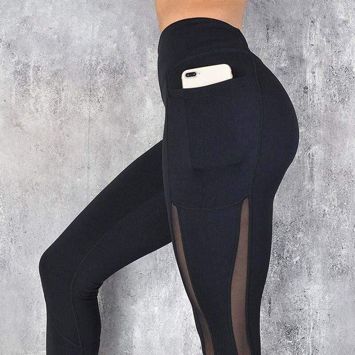 Schwarze Anti-Cellulite-Leggings mit Taschen, seitlichem Mesh-Einsatz, Sportbekleidung.