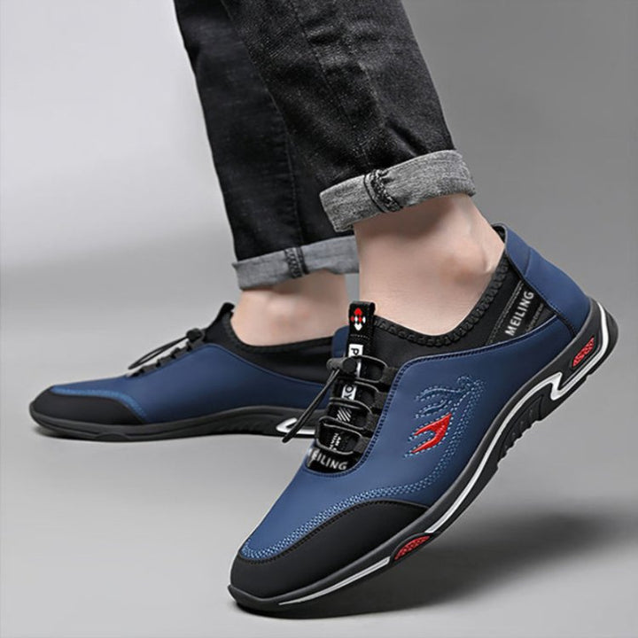 Herren Sneaker, blau-schwarz, sportlich, bequem, modisch, mit rotem Akzent, Freizeitschuh.