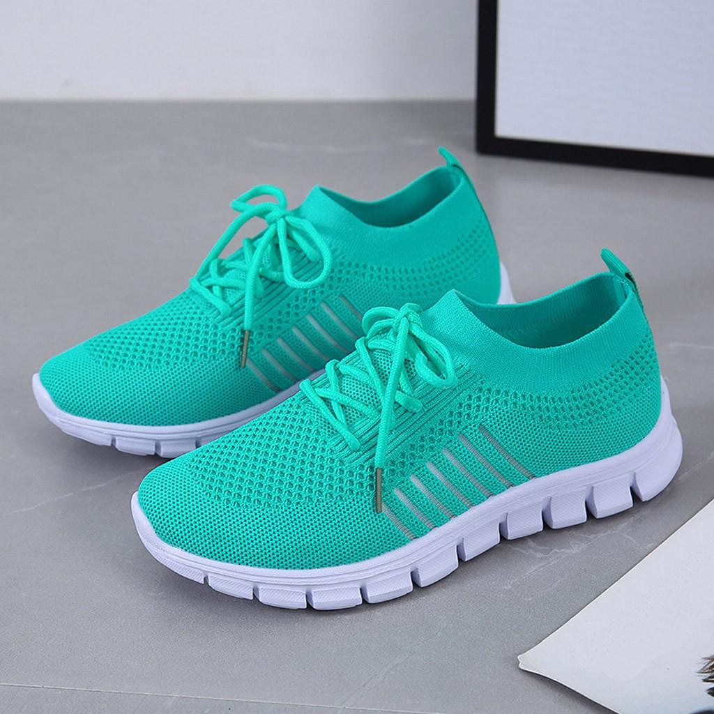 Türkise Sportschuhe, atmungsaktiv, rutschfeste Sohle, ideal für Fitness und Laufen.