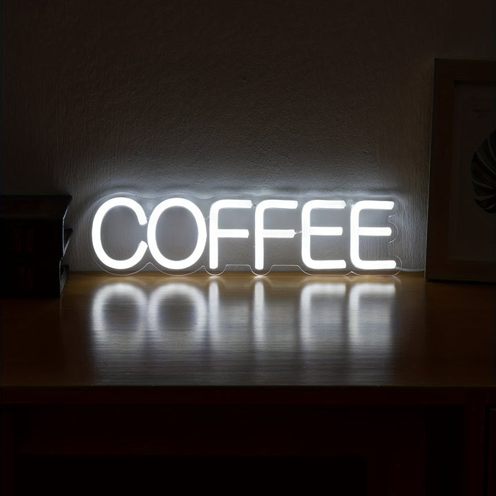 Leuchtendes COFFEE LED-Schild auf Holzoberfläche, dekorative Beleuchtung für Cafés und Küchen.