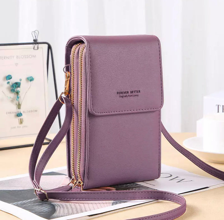 Lila Handy-Umhängetasche aus Leder mit Reißverschluss, modisch und praktisch für Damen.