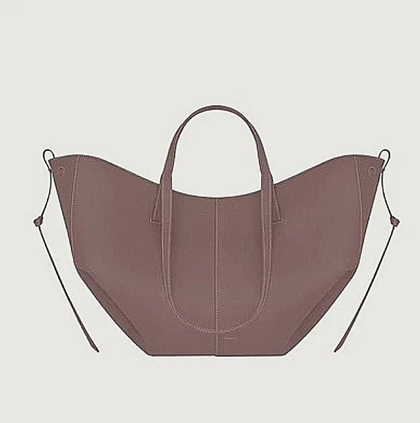 Lila Damenledertasche, modisch, geräumig, mit Henkeln, hochwertiges Design, elegant.